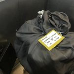 Bag with tags and clothes
